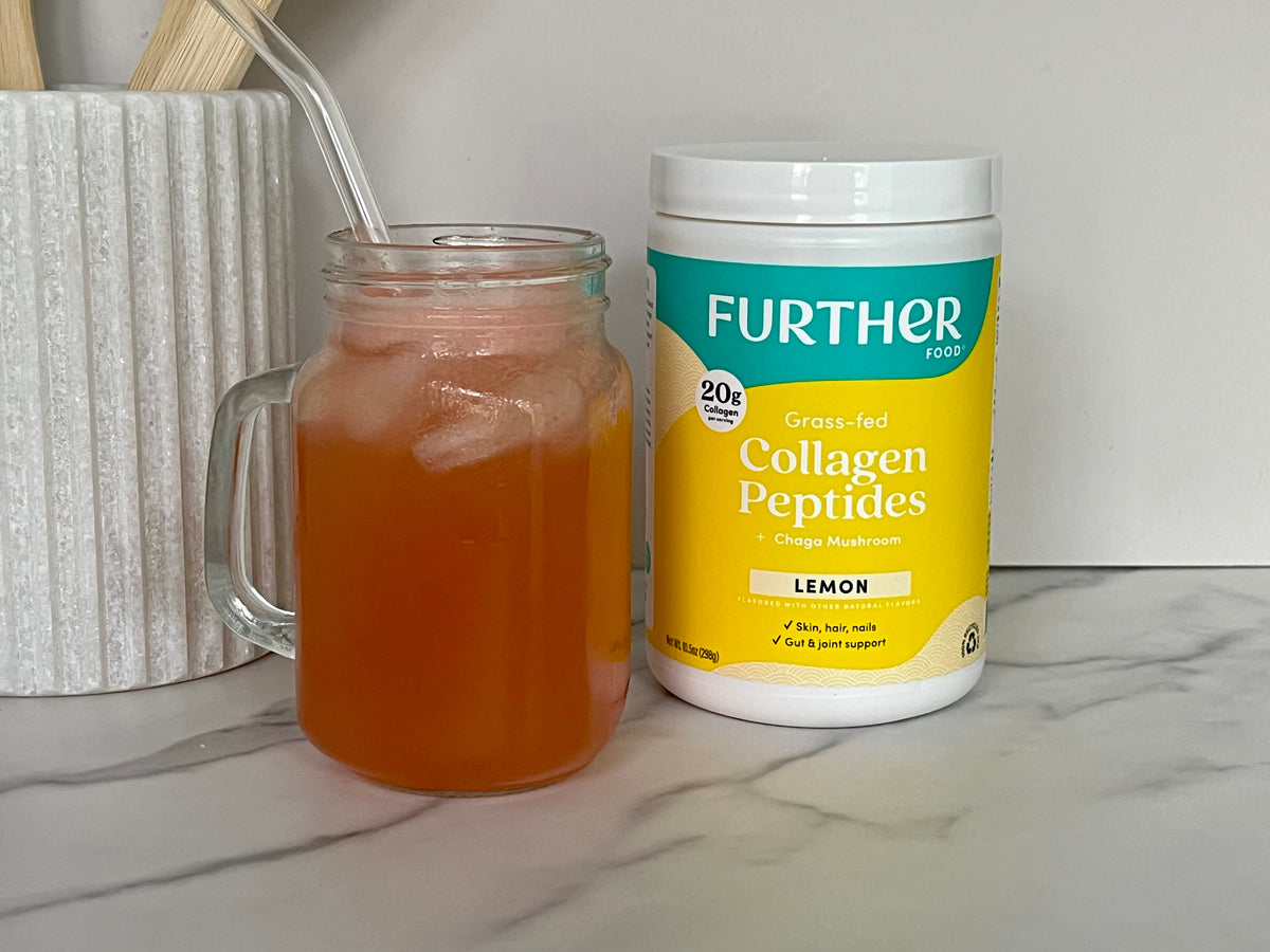 Image of Lemon Collagen Jar and gatorade in a glass